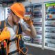 male electrician working electrical panel male electrician overalls min 80x80