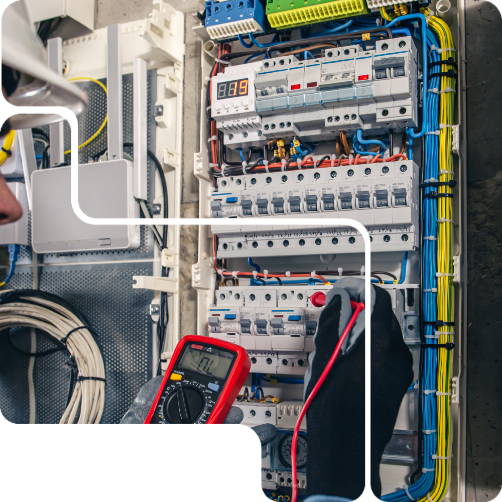 man electrical technician working switchboard with fuses